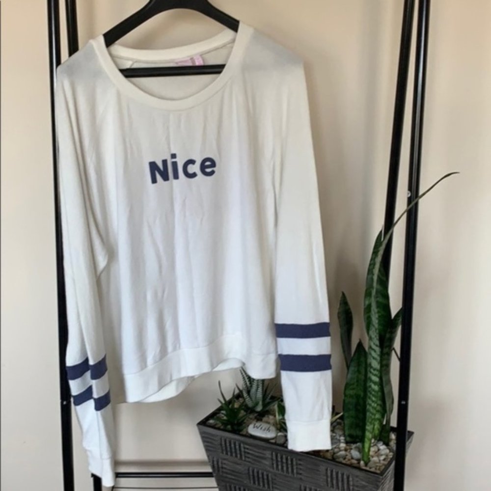 MAKE AND MODEL cream colored sweater size XL.